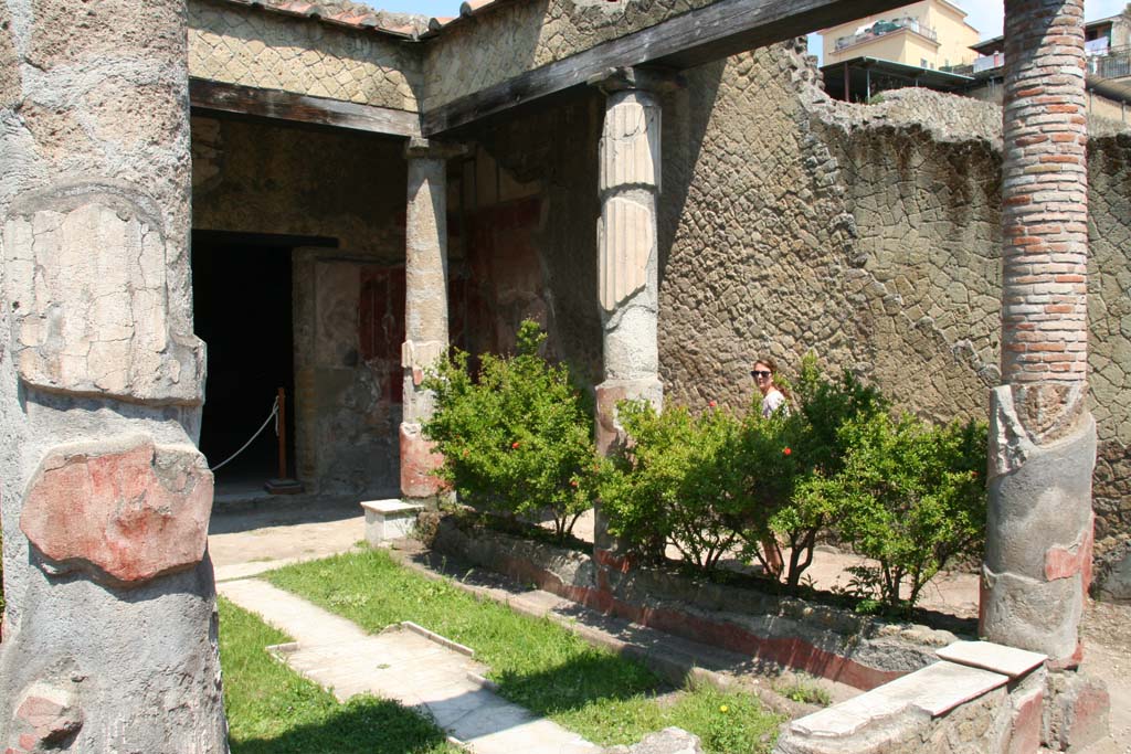 V.30 Herculaneum, April 2011. Looking north-west across atrium towards the tablinum/triclinium 2, on the west end of the atrium. 
Photo courtesy of Klaus Heese.